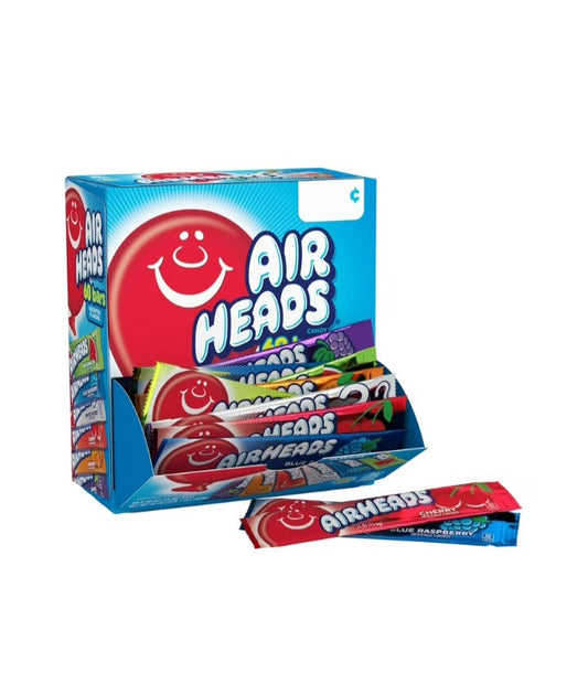 Air heads chewy candy. Picture demonstrates a blue box with a red ballon and has a smiley face. 