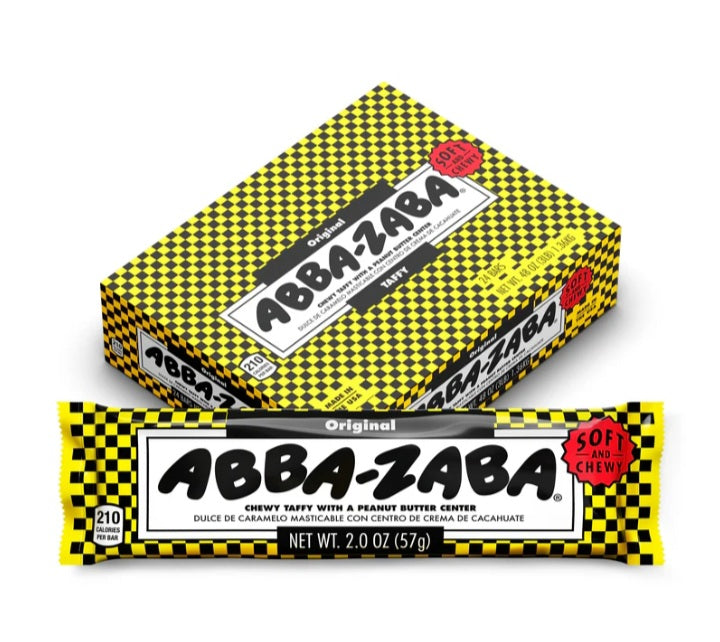 White taffy candy with black and yellow wrapper that says "Abba Zabba".